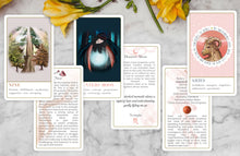 cards laid out in a spread on a marble table top showing: nine, hunters moon, aries