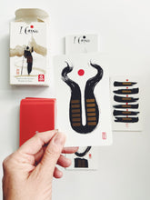 Iching Deck hand holding card