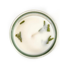 Top down view of white magic hour candle for gratitude