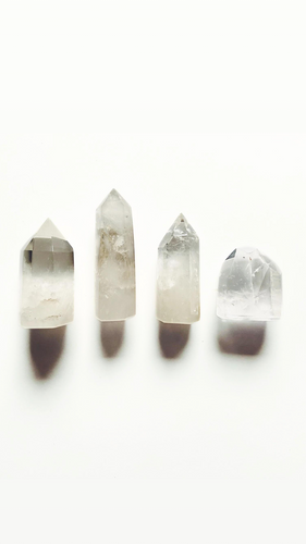 four small crystal quartz points