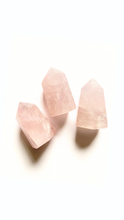 Three crystal rose quartz points