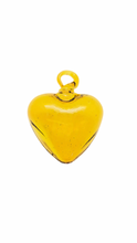 yellow glass heart talisman and pendant 