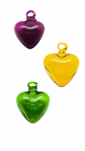 glass hearts in purple, green and yellow