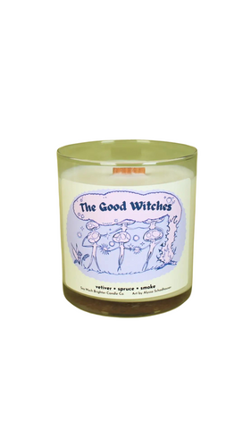 The Good Witches Candle featuring a blend of vetiver, spruce, and smoke scents, crafted from 100% soy wax with a crackling wooden wick. Beautifully illustrated by Alyssa Schadhauser, this 10oz candle embodies the vibe of ‘Do No Harm’ and is made by a dedicated team in Beverly, MA.