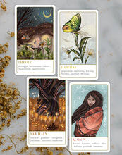 cards showing the magical sabbats of imbolc, samhain, lammas, and mabon